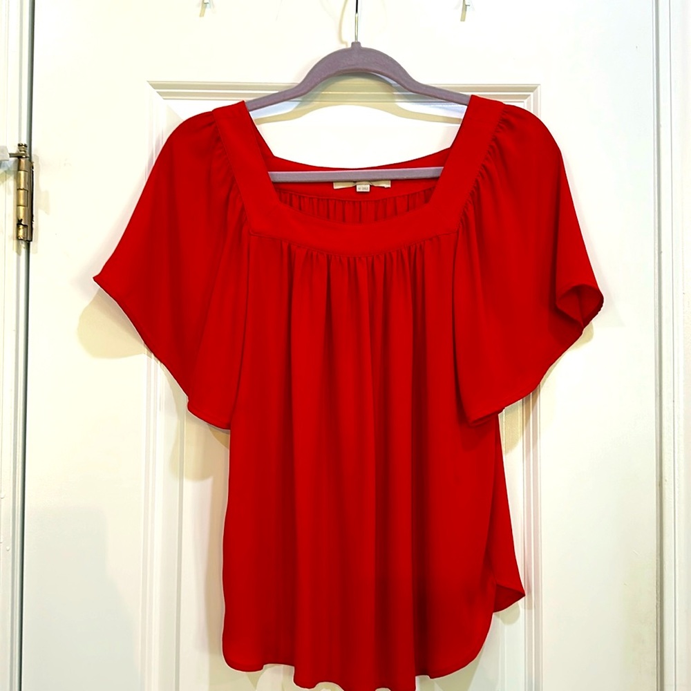 Red flowy sleeve blouse